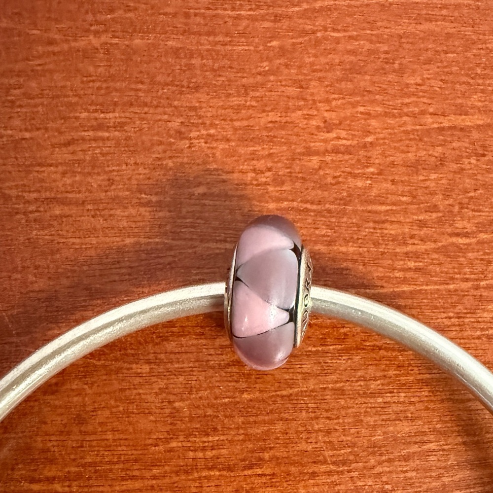 Pandora Silver Captivating purple Murano glass charm.